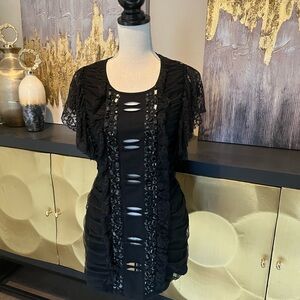 Elegant Black Dress with Lace and Cutout Details